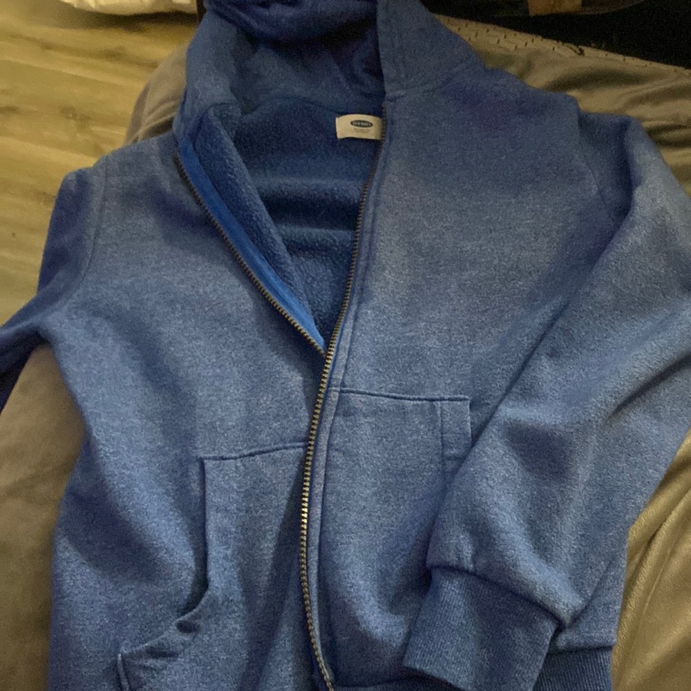 blue zip up sweater